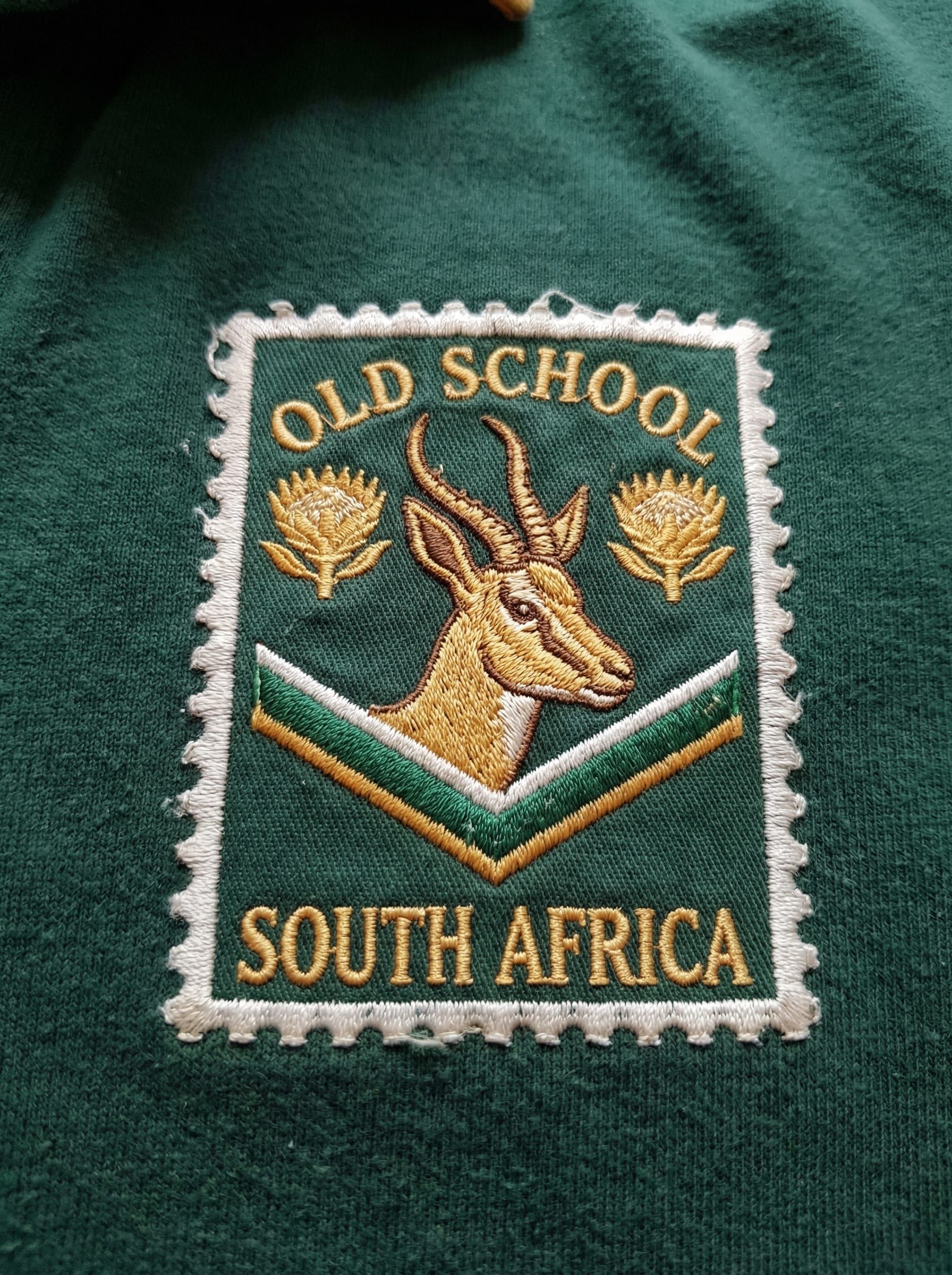 Badge WIP, stamp form, springbok head with chevron, version one